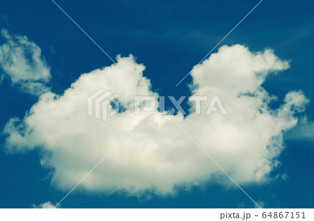 Incredibly wonderful lush cumulus clouds against a 64867151