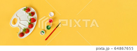 Red ripe strawberries on an artistic palette, 64867655