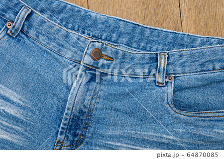 Close up image of blue denim jeans 64870085