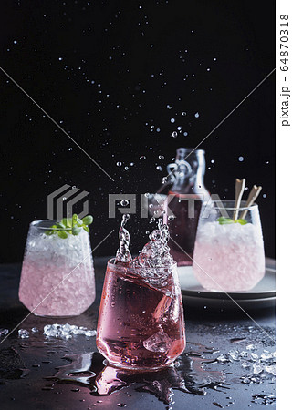 Splash of a pink cocktail Splash of a pink cocktail 64870318