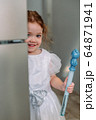 little girl with soap bubbles at home 64871941