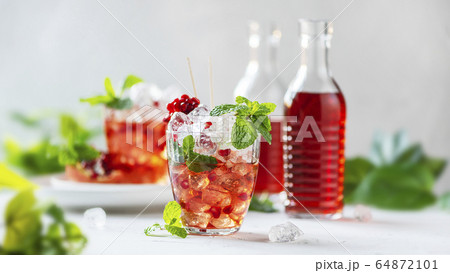 Fresh cocktail with pomegranate 64872101