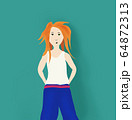 teenager red hair girl in casual clothes drawing isolated on blue wall background 64872313