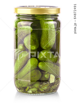 glass jar with cucumbers on a white background glass jar with cucumbers on a white background 64872491