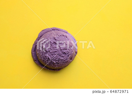 Ice-cream scoop on bright background, copy space Ice-cream scoop on bright background, copy space 64872971