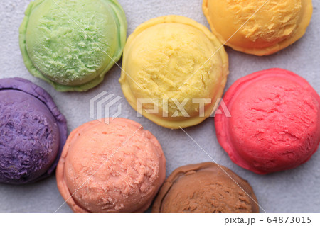 Various flavored ice cream scoops, close up Various flavored ice cream scoops, close up 64873015