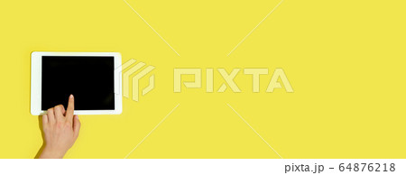 Hand using gadgets, device on top view, blank screen with copyspace, minimalistic style, flyer 64876218