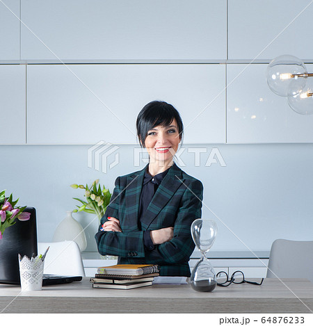Work From Home, WFH concept. Beautiful girl in a Work From Home, WFH concept. Beautiful girl in a 64876233