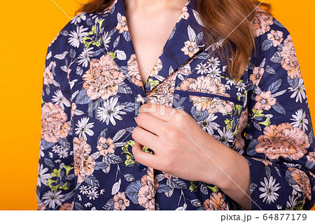 Close-up detail and fabric texture of a pajama. Home wear, sleepwear, shopping and sale concept. 64877179