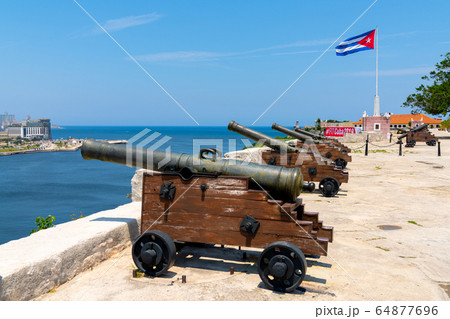 Cannons at Fort of Saint Charles, cuban flag in 64877696
