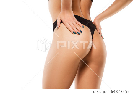 Beautiful female back and buttlocks isolated on white background. Beauty, cosmetics, spa, depilation, treatment and fitness concept, sensual posing Beautiful female back and buttlocks isolated on white background. Beauty, cosmetics, spa, depilation, treatment and fitness concept, sensual posing 64878455