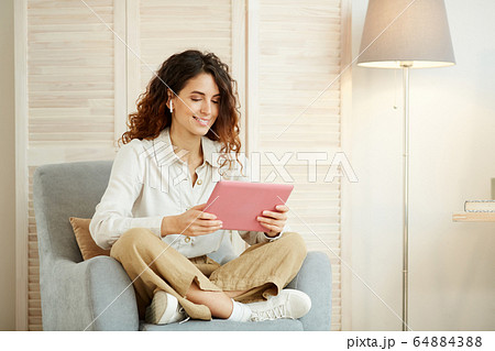 Freelancer With Tablet Computer 64884388