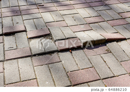 defective cobblestone pavement due to incorrectly 64886210