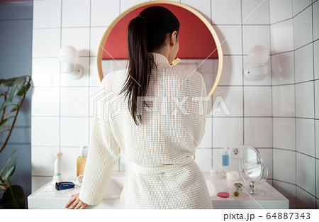 Female with tooth brush at home stock photo 64887343