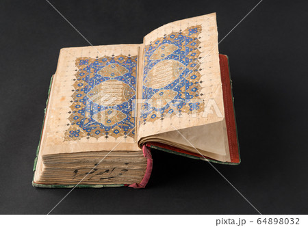 book on black background book on black background 64898032