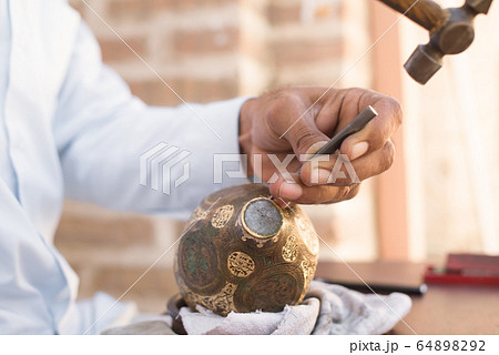 chaser of copper at work chaser of copper at work 64898292