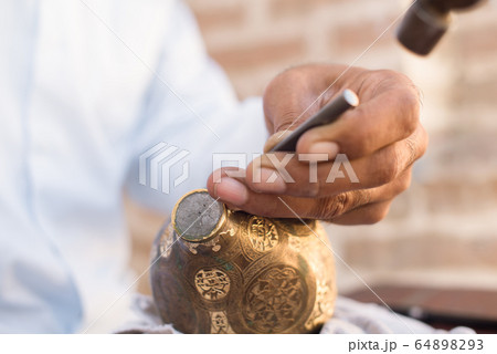 chaser of copper at work chaser of copper at work 64898293