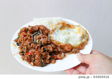 sunny side up egg and stir fried park with chilli sunny side up egg and stir fried park with chilli 64900916