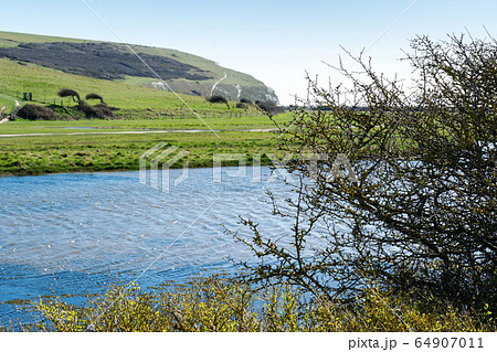 View of Cuckmere river, South Downs National Park, near Seaford and Eastbourne, East Sussex, England View of Cuckmere river, South Downs National Park, near Seaford and Eastbourne, East Sussex, England 64907011