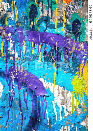 close up of colorful messy painted urban wall 64907349