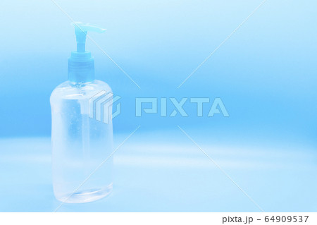 Clear hand sanitizer jel isolated on a blue Clear hand sanitizer jel isolated on a blue 64909537