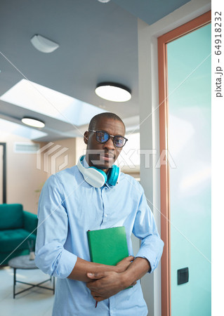 African businessman standing at office African businessman standing at office 64918232