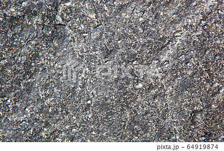 Stone texture in soft sunlight in springtime Stone texture in soft sunlight in springtime 64919874
