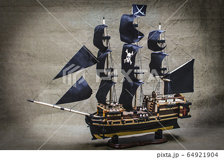 Wooden model of a handmade pirate fighting ship Wooden model of a handmade pirate fighting ship 64921904