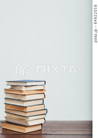 a lot of stacks of educational books for college on a white background a lot of stacks of educational books for college on a white background 64922058