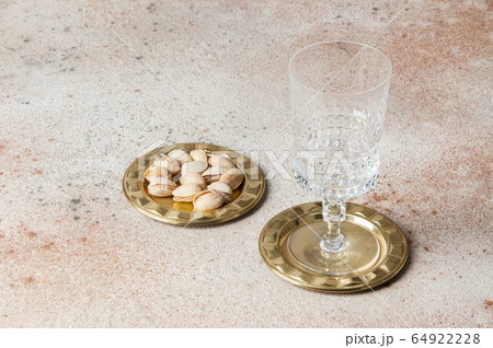Antique brass coasters, small dish on concrete 64922228