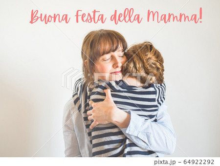Mother and son hugs. Mothers day in Italian Mother and son hugs. Mothers day in Italian 64922292