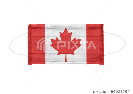 Medical mask toned in Canada flag colors 64922594