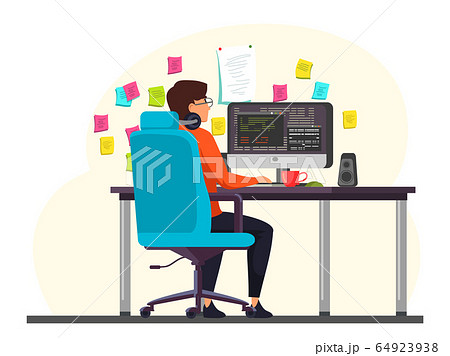 Male programmer working at computer in office 64923938