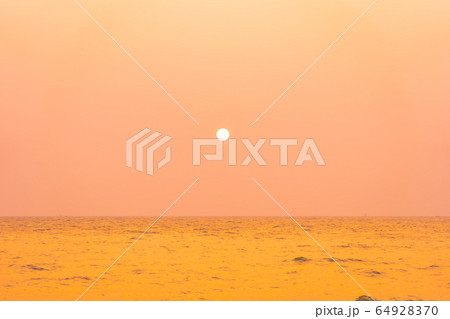 Beautiful tropical nature of sea beach ocean at sunset or sunrise time Beautiful tropical nature of sea beach ocean at sunset or sunrise time 64928370