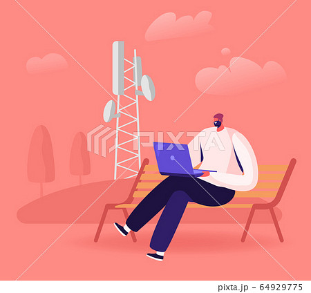 Young Man Sitting on Bench with Laptop in Hands near Transmission Telecommunication Tower Communicating Online 64929775