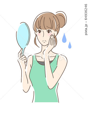 不安な表情で手鏡を見る女性 64936246