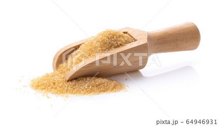 brown sugar in wood scoon on white background brown sugar in wood scoon on white background 64946931