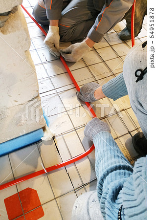 Modern manual storage of underfloor heating in a Modern manual storage of underfloor heating in a 64951878