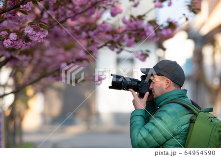 photographer taking photographer taking 64954590