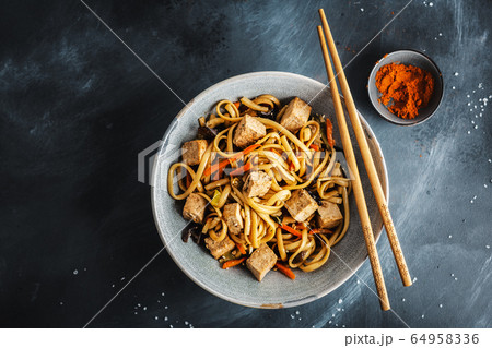 Asian noodles with cheese tofu 64958336