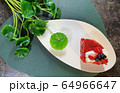 strawberry cake on a white plate and leaves 64966647