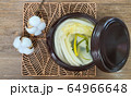 Korean white Kimchi on the wooden mat 64966648