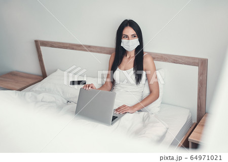Relaxed young female being deep in her thoughts 64971021