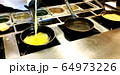 Cooking omelettes and fried eggs. Breakfast buffet 64973226