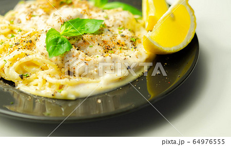 Carbonara, spaghetti with a cheese and smoked 64976555