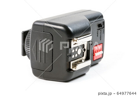Black studio flash transmitter on the white Black studio flash transmitter on the white 64977644