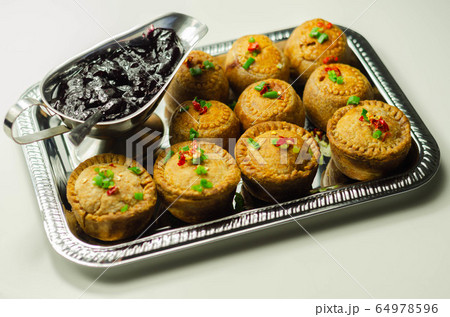 Traditional  English pork pies with cranberry 64978596