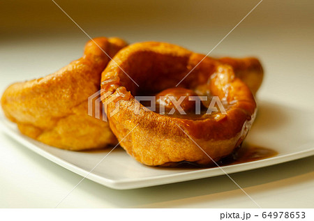 Traditional English Yorkshire pudding with 64978653