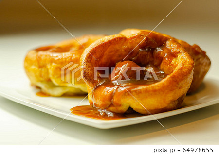 Traditional English Yorkshire pudding with 64978655