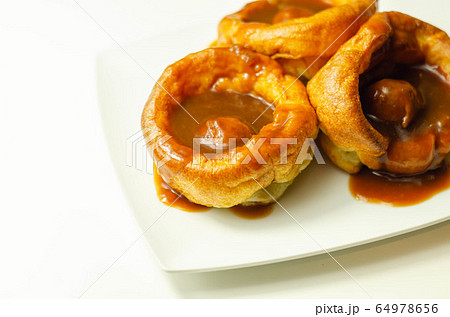 Traditional English Yorkshire pudding with 64978656